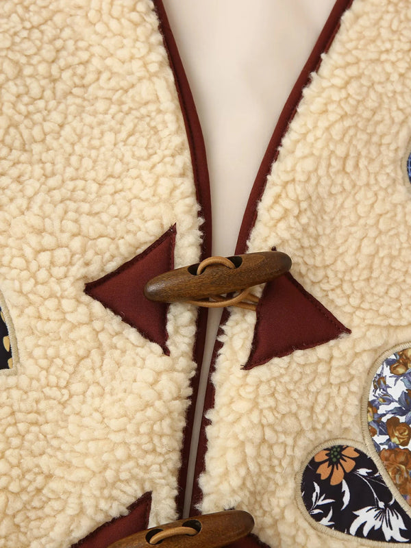 Lambswool vest with appliqué embroidery kakaclo